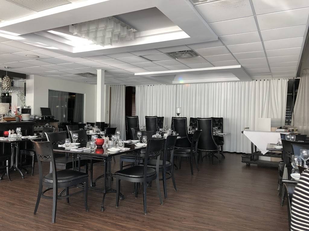 Table 09 | restaurant | 9 Place Frontenac, Pointe-Claire, QC H9R 4Z7, Canada | 5146950620 OR +1 514-695-0620