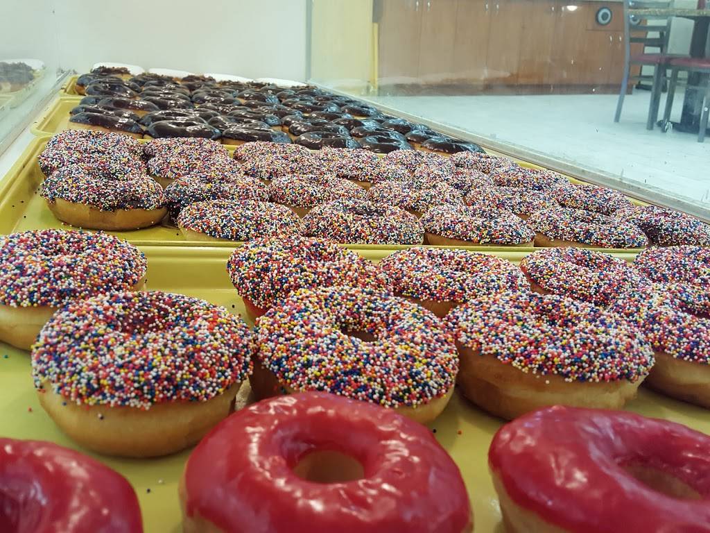 Rickey Meches Donut King | bakery | 101 Sabal Palms Row, Youngsville, LA 70592, USA | 3378565151 OR +1 337-856-5151