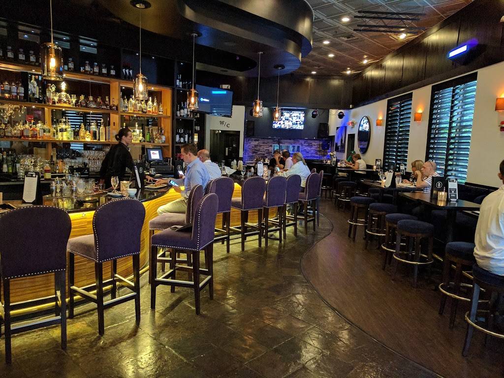 Vines Grille & Wine Bar Restaurant 7533 Sand Lake Rd, Orlando, FL